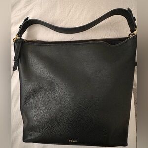 Fossil Leather crossbody with interior pockets in both sides, long & short strap